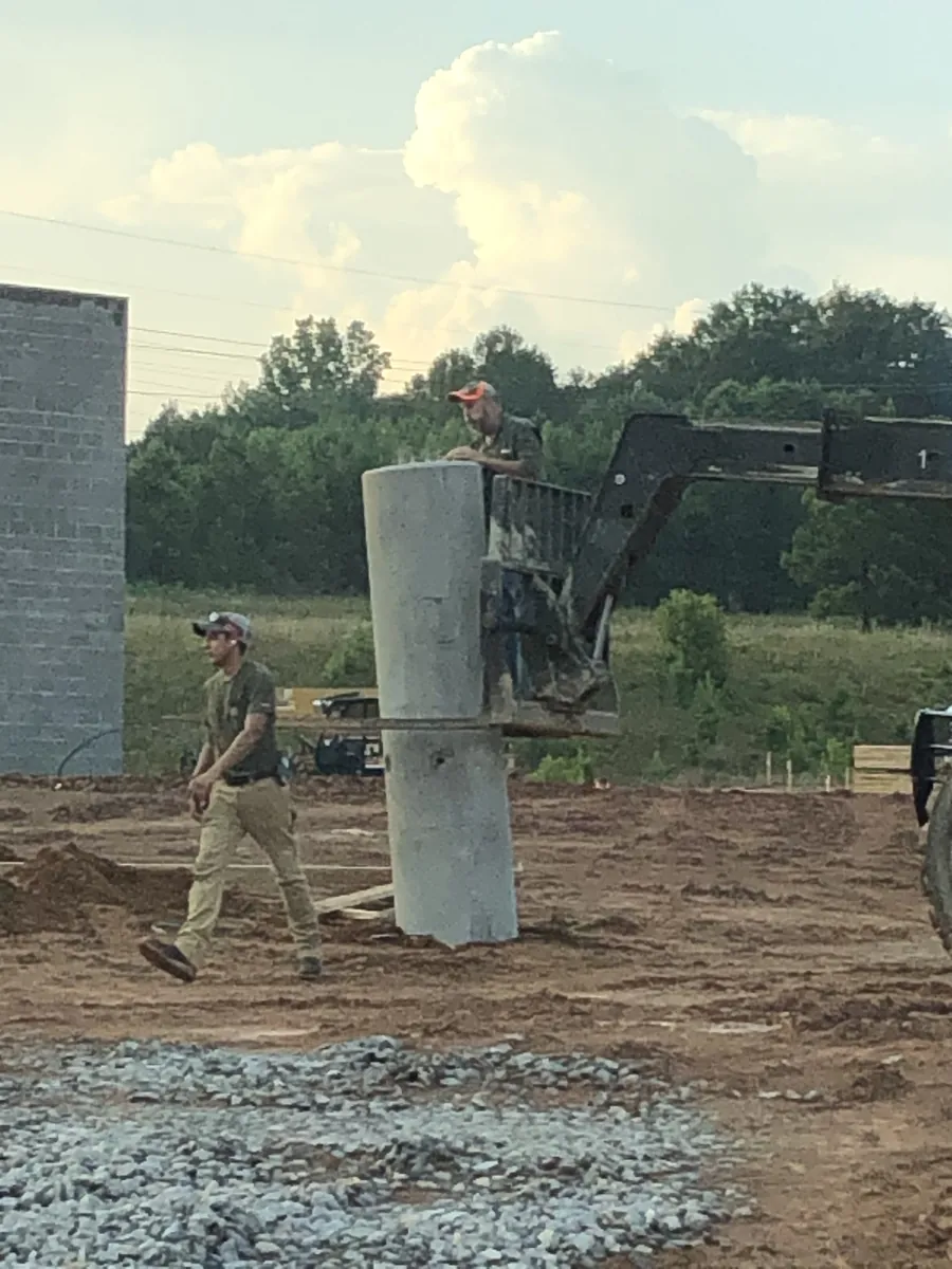 Precast pole base set for a light pole at Tractor Supply, Bremen, Georgia