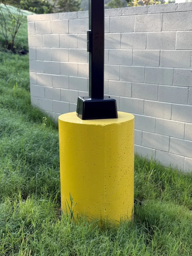 Completed precast pole base with light pole erected at Tractor Supply, Dahlonega, Georgia