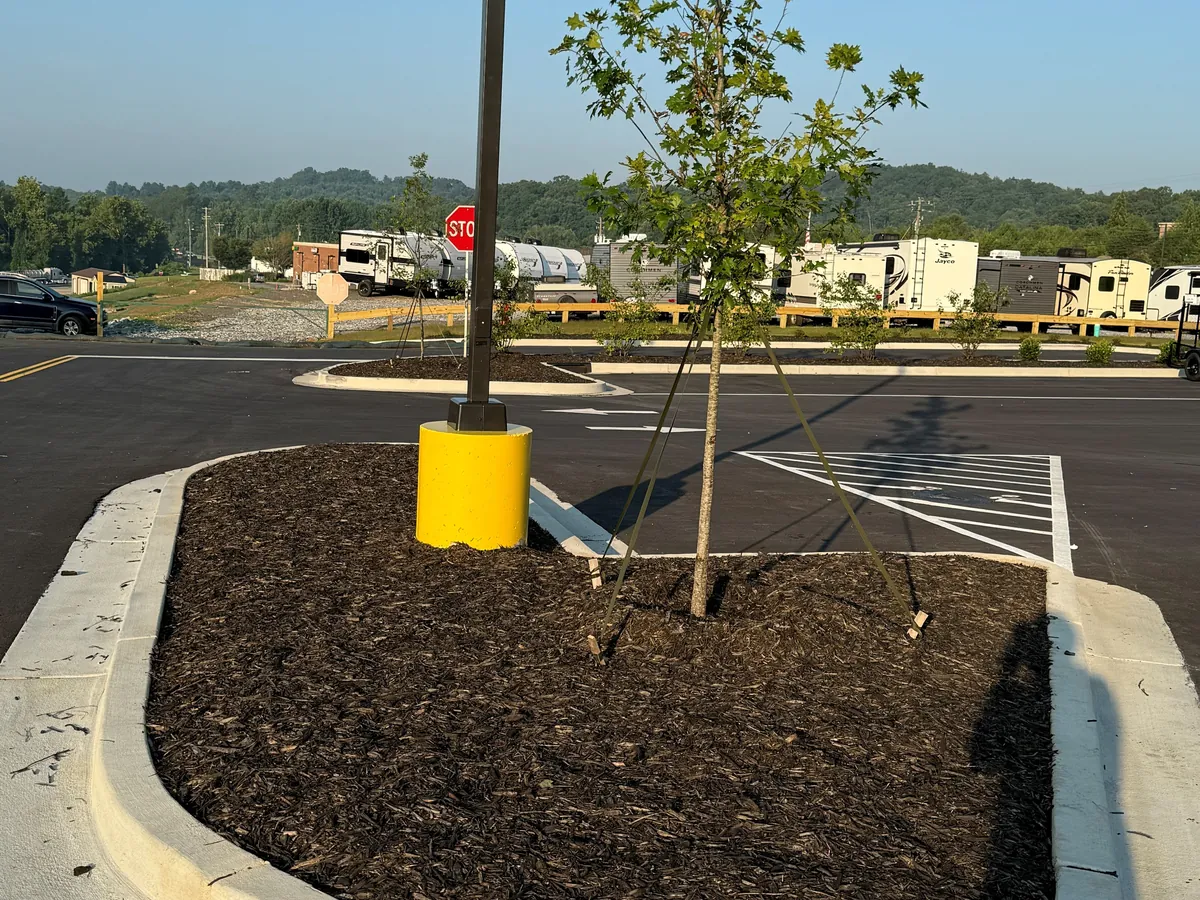 Precast pole base installed for parking lot lighting at Tractor Supply, Dahlonega, Georgia
